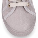 Autumn winter canvas OKAA kids tennis shoes to dress with shoelaces closure in pastel colors.