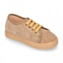 Corduroy canvas OKAA kids tennis shoes to dress with shoelaces closure.