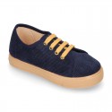 Corduroy canvas OKAA kids tennis shoes to dress with shoelaces closure.