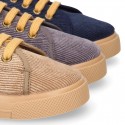 Corduroy canvas OKAA kids tennis shoes to dress with shoelaces closure.