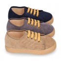 Corduroy canvas OKAA kids tennis shoes to dress with shoelaces closure.