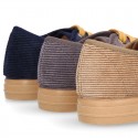 Corduroy canvas OKAA kids tennis shoes to dress with shoelaces closure.