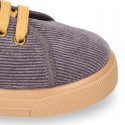 Corduroy canvas OKAA kids tennis shoes to dress with shoelaces closure.