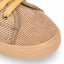 Corduroy canvas OKAA kids tennis shoes to dress with shoelaces closure.