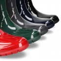 Knee high rain boots in plain colors with glossy finish, in large sizes.