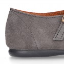 Girl Mary Jane shoes in suede leather with perforated design and buckle fastening.