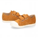 Kids suede leather Tennis type shoes with laceless and toe cap in TAN color.