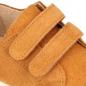 Kids suede leather Tennis type shoes with laceless and toe cap in TAN color.