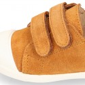 Kids suede leather Tennis type shoes with laceless and toe cap in TAN color.