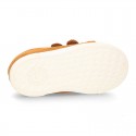 Kids suede leather Tennis type shoes with laceless and toe cap in TAN color.