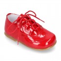 Classic English style shoes in RED patent leather.