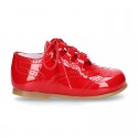 Classic English style shoes in RED patent leather.