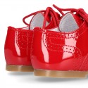 Classic English style shoes in RED patent leather.