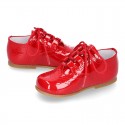 Classic English style shoes in RED patent leather.