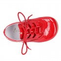 Classic English style shoes in RED patent leather.