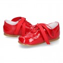 Classic Laces up shoes in red patent leather.