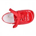 Classic Laces up shoes in red patent leather.