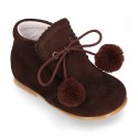 Classic suede leather ankle boots with POMPONS.