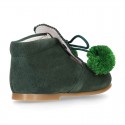 Classic suede leather ankle boots with POMPONS.