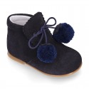 Classic suede leather ankle boots with POMPONS.