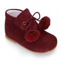 Classic suede leather ankle boots with POMPONS.