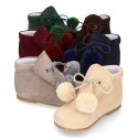 Classic suede leather ankle boots with POMPONS.