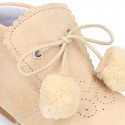 Classic suede leather ankle boots with POMPONS.