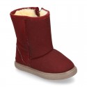 OKAA design Australian style Boot shoes with fake hair lining in fall colors.