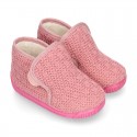 Structured wool knit bootie home shoes with hook and loop strap.