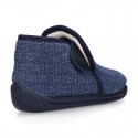 Structured wool knit bootie home shoes with hook and loop strap.