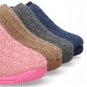 Structured wool knit bootie home shoes with hook and loop strap.