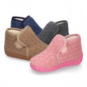 Structured wool knit bootie home shoes with hook and loop strap.