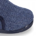 Structured wool knit bootie home shoes with hook and loop strap.
