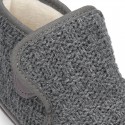 Structured wool knit bootie home shoes with hook and loop strap.