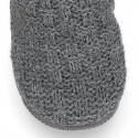 Structured wool knit bootie home shoes with hook and loop strap.