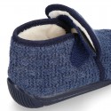 Structured wool knit bootie home shoes with hook and loop strap.