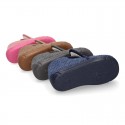 Structured wool knit bootie home shoes with hook and loop strap.