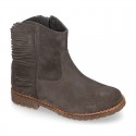 Ankle boot shoes in suede leather with fringed detail.