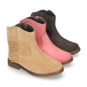 Ankle boot shoes in suede leather with fringed detail.