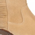 Ankle boot shoes in suede leather with fringed detail.