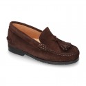 Classic suede leather moccasins with tassels and thick soles.