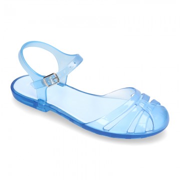 Jelly ballet style shoes with buckle fastening for beach and pool use.