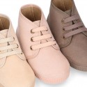 Kids canvas Casual Bootie shoes with laces in pastel colors.