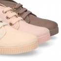 Kids canvas Casual Bootie shoes with laces in pastel colors.