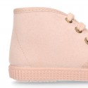 Kids canvas Casual Bootie shoes with laces in pastel colors.