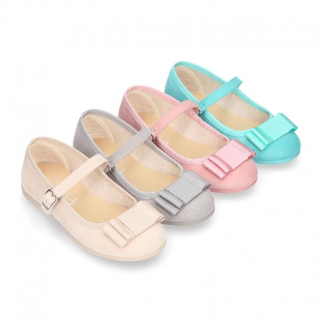 Spring summer canvas little Mary Janes with shoemaker bow in pastel colors.