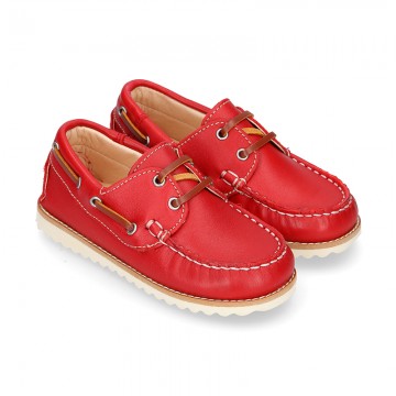 Classic kids leather Boat shoes with shoelaces and spring summer soles.