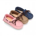 Nobuck leather Moccasin shoes with contraste bows for little kids.