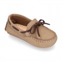 Nobuck leather Moccasin shoes with contraste bows for little kids.