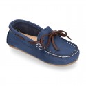 Nobuck leather Moccasin shoes with contraste bows for little kids.